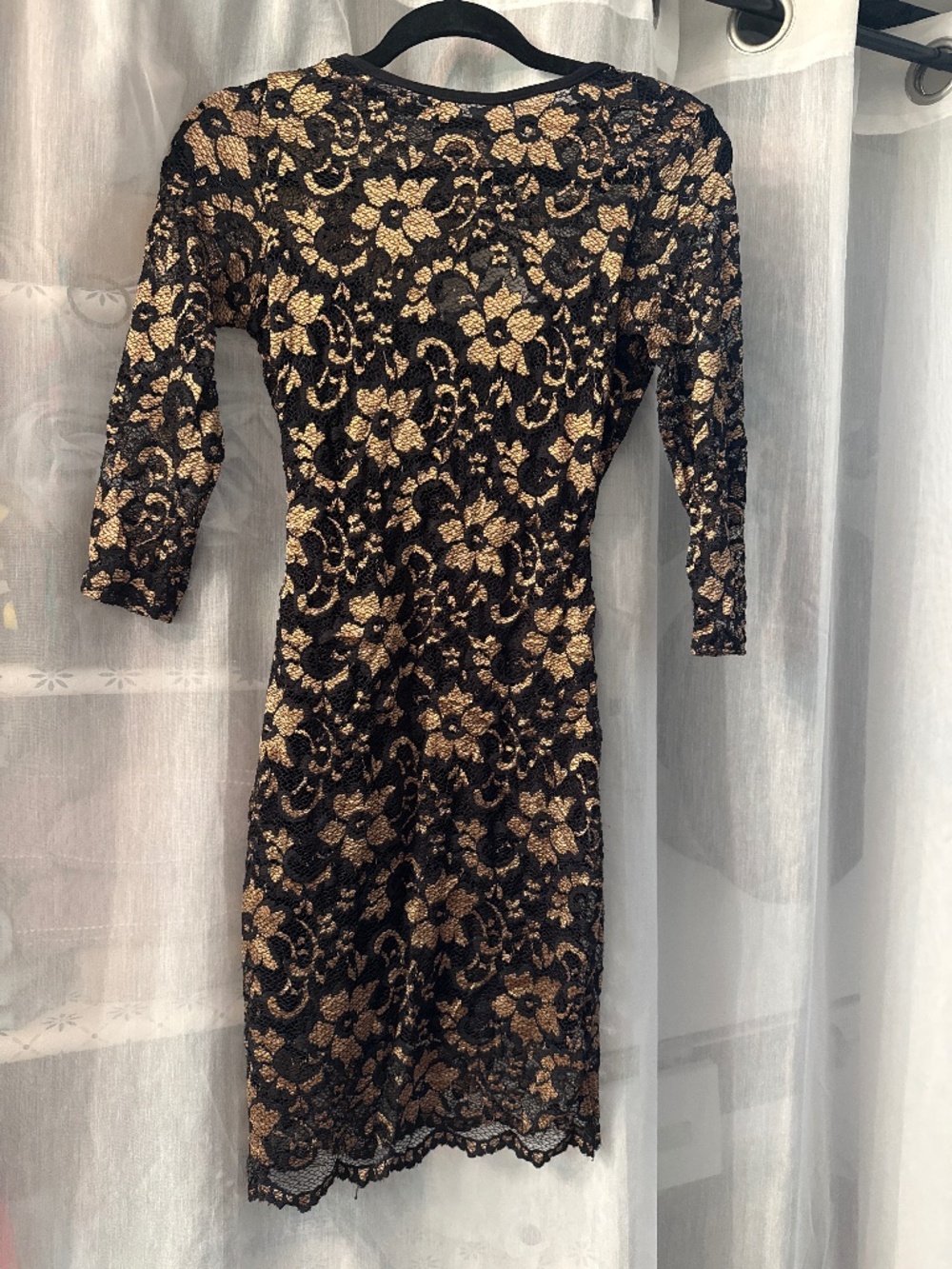 Black and gold lace dress